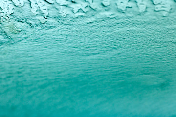 blurred of drops of rain on glass.