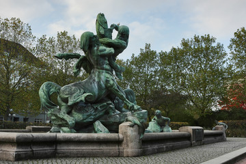 Fototapeta na wymiar Stuhlmann's fountain in the Hamburg district Altona. The fountain is a famous landmark in Altona.