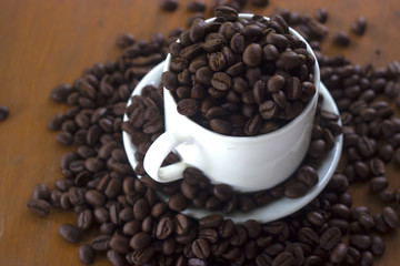 coffee beans on wooden background
