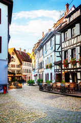 Fototapeta na wymiar cosy street of Petit France medieval district of Strasbourg, Alsace France, retro toned