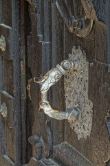 Very old, original metal knocker on the door