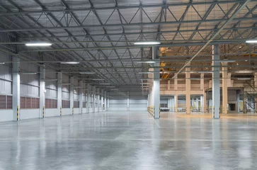 Acrylic prints Industrial building Concrete floor inside industrial building. Use as large factory, warehouse, storehouse, hangar or plant. Modern interior with metal wall and steel structure with empty space for industry background.