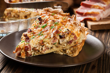 Pieces of quiche lorraine with bacon and cheese