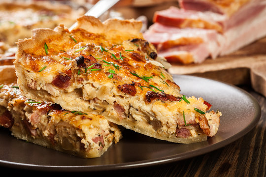 Pieces of quiche lorraine with bacon and cheese