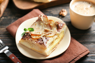 Plate with delicious pastry, closeup