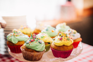 Homemade Sweets Muffins in Sweets Shop Closeup Background