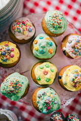 Fototapeta na wymiar Homemade Sweets Muffins in Sweets Shop Closeup Background
