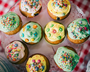 Homemade Sweets Muffins in Sweets Shop Closeup Background