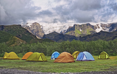 Big tourist camp is located in the valley of the park near the glacier , Iceland