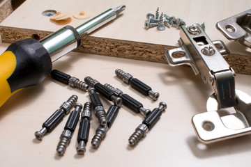 bolt. furniture accessories. screw. screwdriver. door hinges