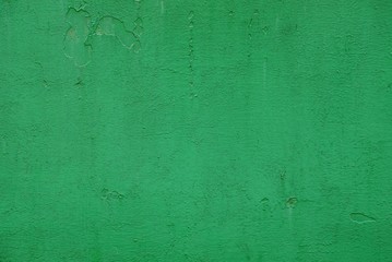 текстура из старой зелёной железной стены частного здания