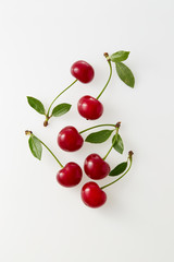 Sour cherries on white background. Organic sour cherry, ripe.