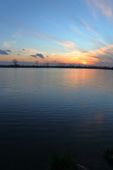 Fototapeta na wymiar Gorgeous sunset over the lake