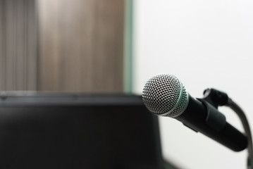 Fototapeta premium Microphone in training room in selective focus.