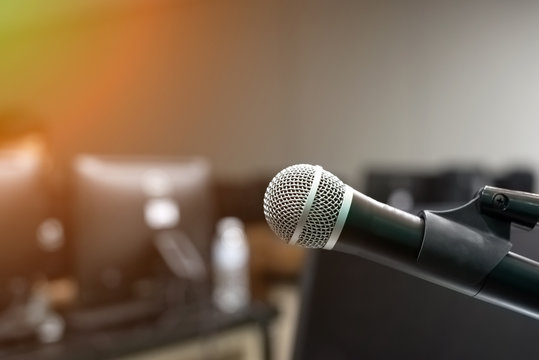 Microphone in training room in selective focus.