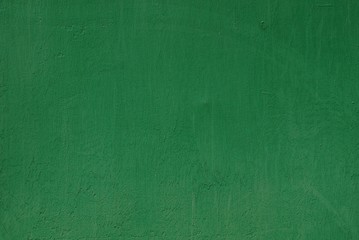 зелёный фон из части бетонной стены жилого здания 