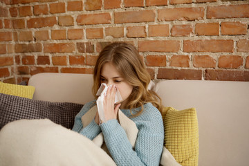 Young woman with cold, flue.
