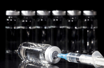 Glass Medicine Vials and Syringe