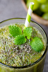 Grape smoothie, on the grey  background.