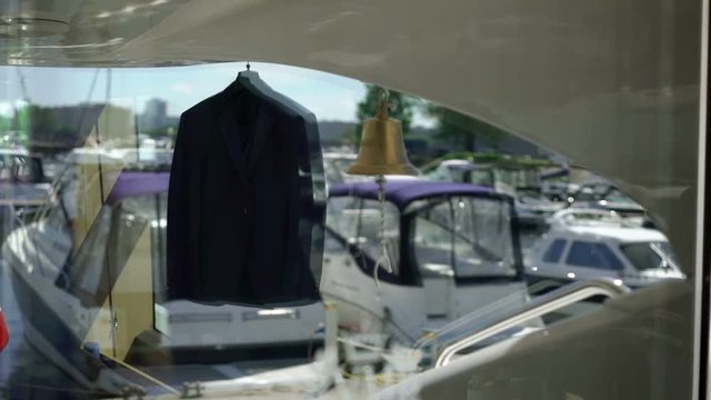 Man's suit on luxury yacht