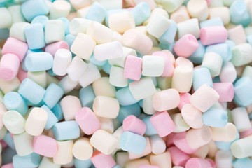 Background or texture of colorful mini marshmallows.