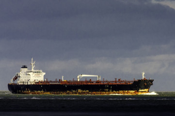 A rusty old tanker inward bound in the Elbe estuary off Cuxhaven