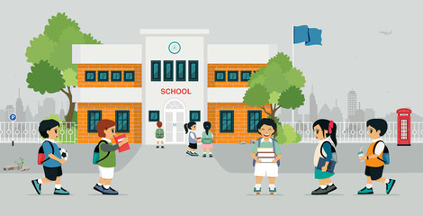 Schoolboy is going to school with gray background. © intararit