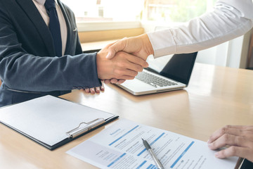Job applicant having interview, Welcome to team Business people handshake with executive manager to Sign Approval Into the company, business meeting, Greeting deal, congratulation