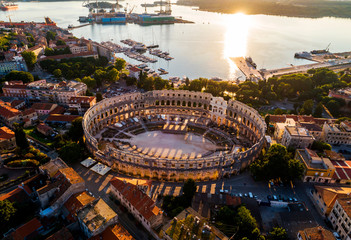 Pula Arena at sunset - HDR aerial view taken by a professional drone. The Roman Amphitheater of...