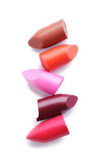 Colorful lipsticks on a white background