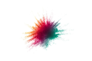 Explosion of colored powder on white background