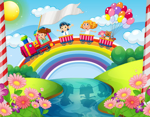 Obraz premium Children riding on train over rainbow