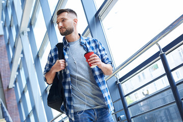 Handsome guy holding red cup