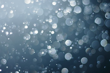 A beautiful and blurry bokeh on a blue background.