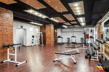 Interior view of a gym with equipment.