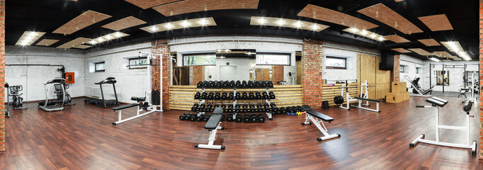 Interior view of a gym with equipment.
