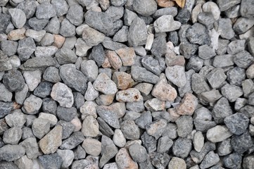 Naturally polished rock pebbles background, rock abstract background