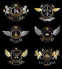 Vintage heraldry design templates, vector emblems created with bird wings, crowns, stars, armory and animal illustrations. Collection of vintage style symbols.