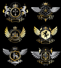 Vintage heraldry design templates, vector emblems created with bird wings, crowns, stars, armory and animal illustrations. Collection of vintage style symbols.