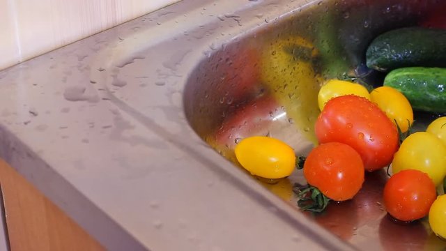 Tomatoes washing with clean water splash drops. HD