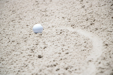 Golf Ball in Sand Trap
