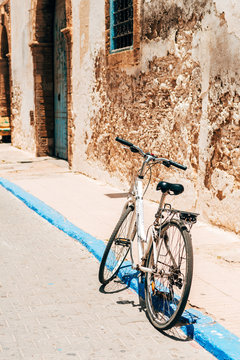 old bike standing at street of essaouira