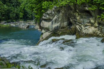 mountain river with waterfall