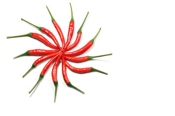 Red chili pepper star shape on white background