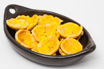 Plantain cups on traditional black ceramic dish