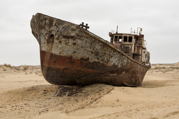 Old ships in the desert ship cemetery the consequence of Aral sea disaster, Muynak, Uzbekistan - 162920944
