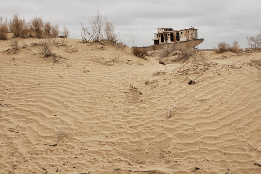 Old ships in the desert ship cemetery the consequence of Aral sea disaster, Muynak, Uzbekistan