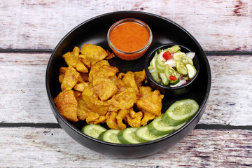 Charcoal boiled ,Pork satay served with side disk.