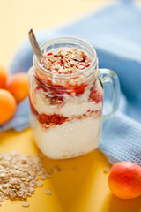 Yogurt with cereal and apricots for Breakfast