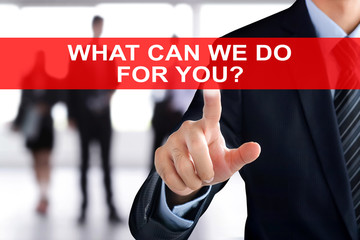 Businessman hand touching WHAT CAN WE DO FOR YOU text on virtual screen